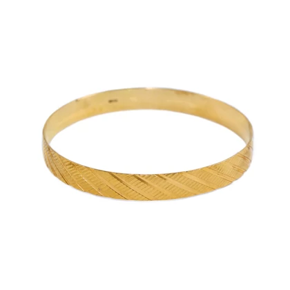 Vésett sárga arany merev karkötő